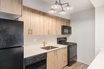 Kitchen with wooden cabinets